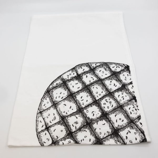 vzorec belokranjske pogače na kuhinjski krpi